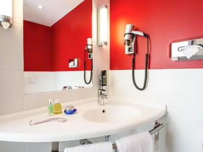 Ein Badezimmer in der Unterkunft Ibis München Airport Süd