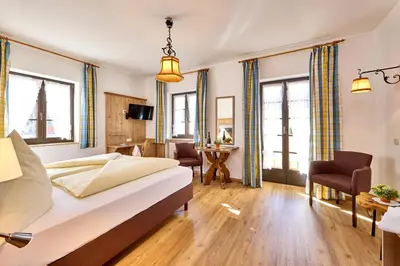 Ein Bett oder Betten in einem Zimmer der Unterkunft Hotel Drei Mohren
