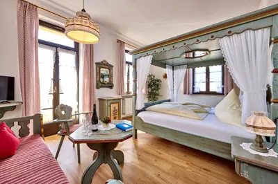 Ein Bett oder Betten in einem Zimmer der Unterkunft Hotel Drei Mohren