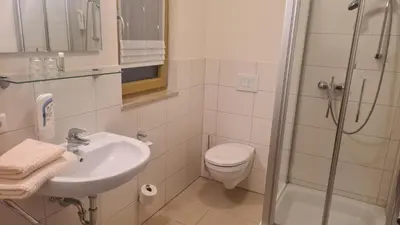 Ein Badezimmer in der Unterkunft Landhotel Winter