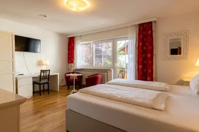 Ein Bett oder Betten in einem Zimmer der Unterkunft Gästehaus Guggenberger
