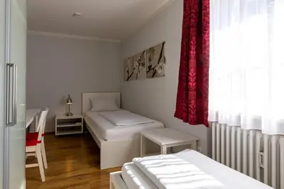 Ein Bett oder Betten in einem Zimmer der Unterkunft Gästehaus Guggenberger