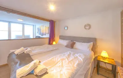 Ein Bett oder Betten in einem Zimmer der Unterkunft GM-Stays Wendelstein Lodge - Sauna & Alpenblick - BRIGHT Collection