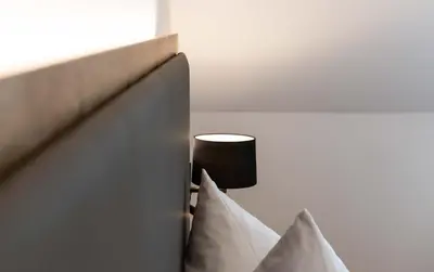 Ein Bett oder Betten in einem Zimmer der Unterkunft Hotel Gasthof Rosenwirt