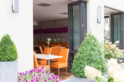 Ein Garten an der Unterkunft Hotel Arooma