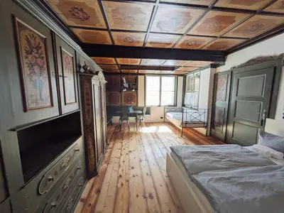 Ein Bett oder Betten in einem Zimmer der Unterkunft Schloss Mörlbach
