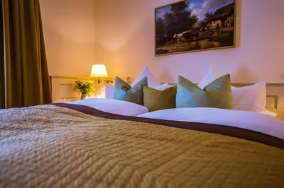 Ein Bett oder Betten in einem Zimmer der Unterkunft Hotel Kandler