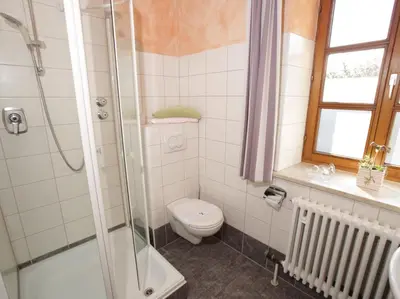 Ein Badezimmer in der Unterkunft Gasthof Huberwirt GmbH