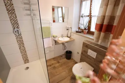 Ein Badezimmer in der Unterkunft Gasthof Huberwirt GmbH
