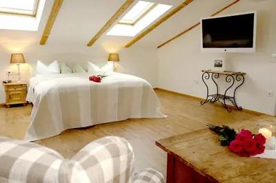 Ein Bett oder Betten in einem Zimmer der Unterkunft Hotel Maier zum Kirschner