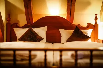 Ein Bett oder Betten in einem Zimmer der Unterkunft Hotel-Brauereigasthof Josef Fuchs