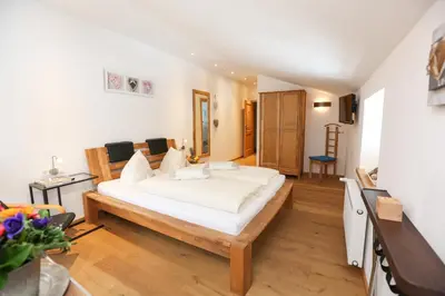 Ein Bett oder Betten in einem Zimmer der Unterkunft Schwaigeralm