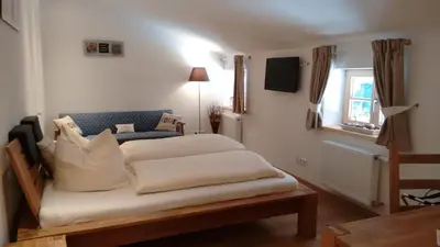Ein Bett oder Betten in einem Zimmer der Unterkunft Schwaigeralm
