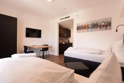 Ein Bett oder Betten in einem Zimmer der Unterkunft Living Neuburg