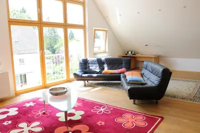Ein Sitzbereich in der Unterkunft Apartment Dachgalerie 110 m2