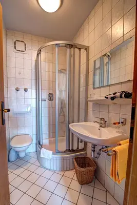 Ein Badezimmer in der Unterkunft Hotel Huber