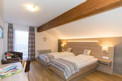 Ein Bett oder Betten in einem Zimmer der Unterkunft Gästehaus Funk