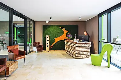 Ein Sitzbereich in der Unterkunft Green Deer Bavarian Hotel