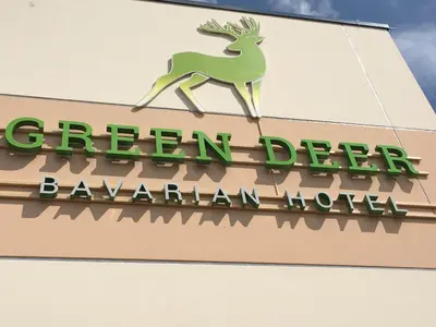 Ein Zertifikat, Auszeichnung, Logo oder anderes Dokument, das in der Unterkunft Green Deer Bavarian Hotel ausgestellt ist