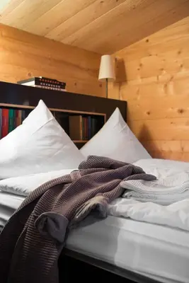 Ein Bett oder Betten in einem Zimmer der Unterkunft Gästehaus berge - design apartments