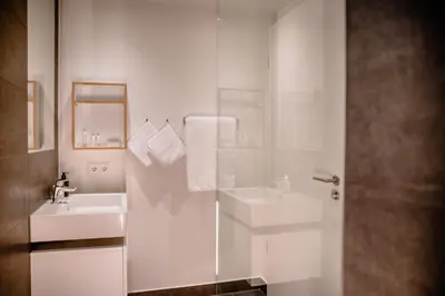 Ein Badezimmer in der Unterkunft THE FLAG München M.