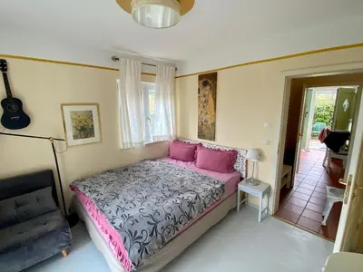 Ein Bett oder Betten in einem Zimmer der Unterkunft Villa Musica