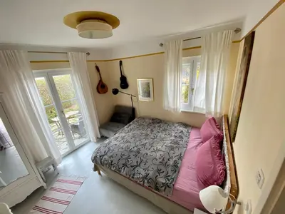 Ein Bett oder Betten in einem Zimmer der Unterkunft Villa Musica
