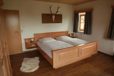 Ein Bett oder Betten in einem Zimmer der Unterkunft Ferienwohnung Fritzenwenger
