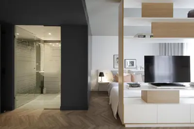 Ein Bett oder Betten in einem Zimmer der Unterkunft smartments München Parkstadt Schwabing
