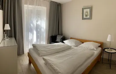 Ein Bett oder Betten in einem Zimmer der Unterkunft Arena Stadt München
