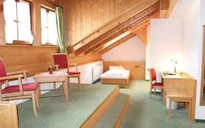 Ein Sitzbereich in der Unterkunft Hotel Schatten