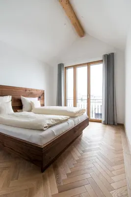 Ein Bett oder Betten in einem Zimmer der Unterkunft Griesbräu zu Murnau