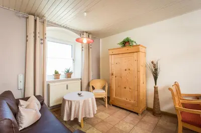 Ein Sitzbereich in der Unterkunft Gästehaus Herb