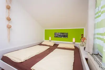 Ein Bett oder Betten in einem Zimmer der Unterkunft Gästehaus Herb