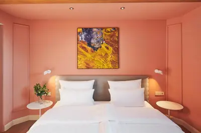 Ein Bett oder Betten in einem Zimmer der Unterkunft MOMA1890 Boutique Hotel