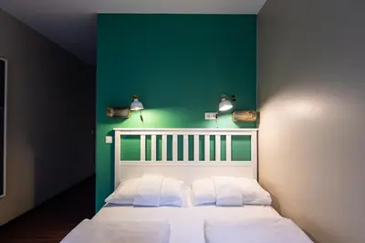 Ein Bett oder Betten in einem Zimmer der Unterkunft Wombat's City Hostel Munich Hauptbahnhof