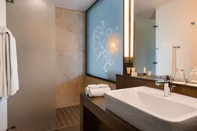 Ein Badezimmer in der Unterkunft Infinity Hotel & Conference Resort Munich