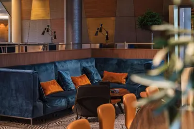 Ein Sitzbereich in der Unterkunft Infinity Hotel & Conference Resort Munich