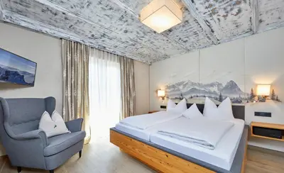 Ein Bett oder Betten in einem Zimmer der Unterkunft Landhotel zum Bad