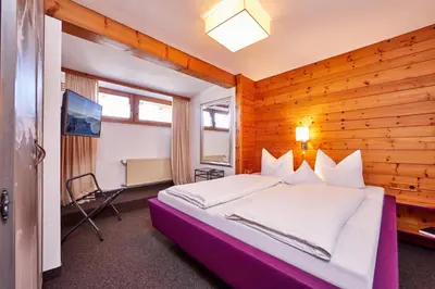 Ein Bett oder Betten in einem Zimmer der Unterkunft Landhotel zum Bad