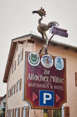 Ein Zertifikat, Auszeichnung, Logo oder anderes Dokument, das in der Unterkunft Zur Allacher Mühle ausgestellt ist