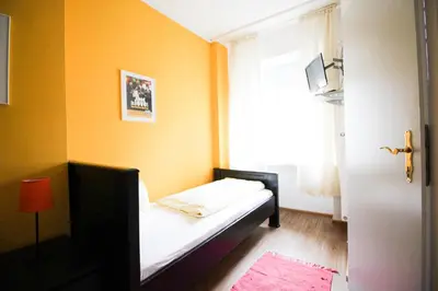 Ein Bett oder Betten in einem Zimmer der Unterkunft Hotel Pension am Hauptbahnhof