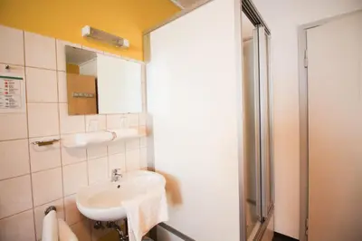 Ein Badezimmer in der Unterkunft Hotel Pension am Hauptbahnhof