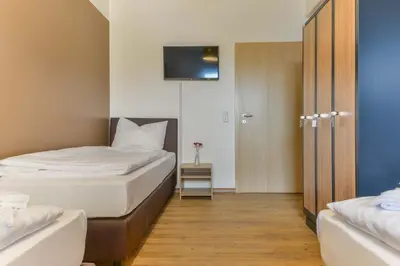 Ein Bett oder Betten in einem Zimmer der Unterkunft My Hostel