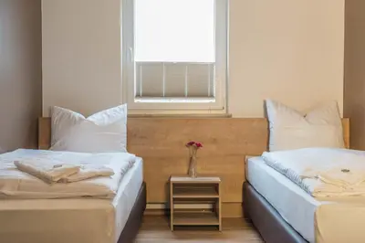Ein Bett oder Betten in einem Zimmer der Unterkunft My Hostel