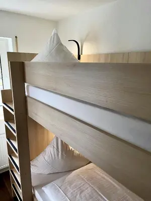 Ein Bett oder Betten in einem Zimmer der Unterkunft Marias Inn Hotel & Apartments Garching bei München