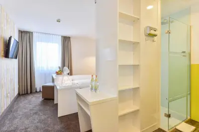 Ein Badezimmer in der Unterkunft Hotel Günter