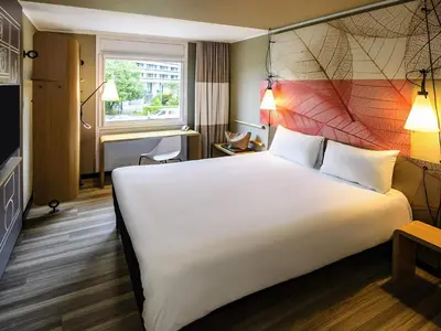 Ein Bett oder Betten in einem Zimmer der Unterkunft ibis Hotel Muenchen City West