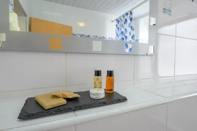 Ein Badezimmer in der Unterkunft Hotel Pension Margit