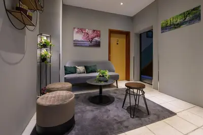 Ein Sitzbereich in der Unterkunft Hotel Pension Margit